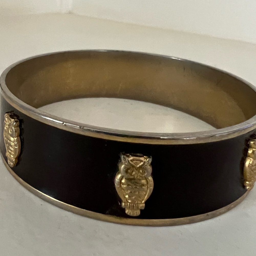 Janna Conner bangle bracelet with gold tone owls. Very good pre owned.